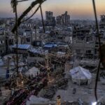 Palestinians mourn slain Hamas militant chief as Israel escalates Gaza attacks