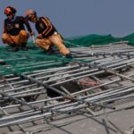 Philippine rescuers racing against time a day after deadly building collapse