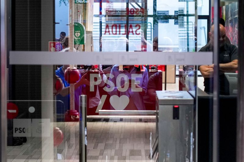 Police at Spain’s ruling Socialists HQ as part of probe into ex party official