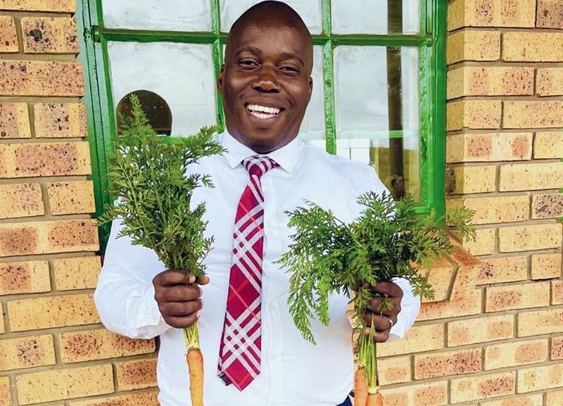 How one principal is sowing the seeds to feed a village