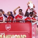 Arsenal fans line London streets in Premier League victory parade