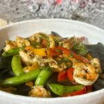 Prawns with squid ink pasta tubes