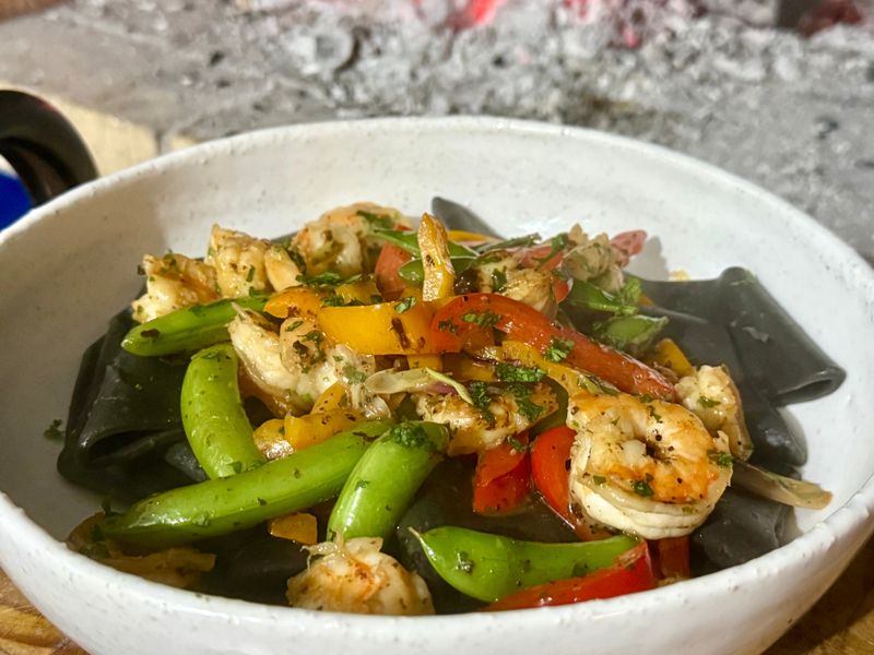 Prawns with squid ink pasta tubes