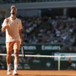 Djokovic fights hard to keep title hopes alive at Roland Garros