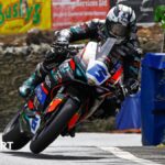 Isle of Man TT: Michael Dunlop claims record-extending Supersport win