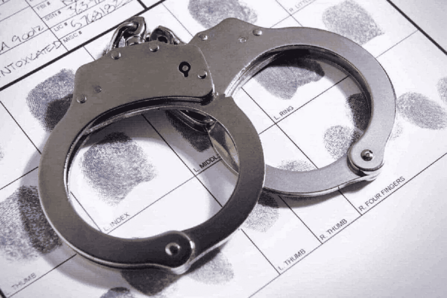 Police charge suspect filmed senselessly beating an elderly woman in tavern