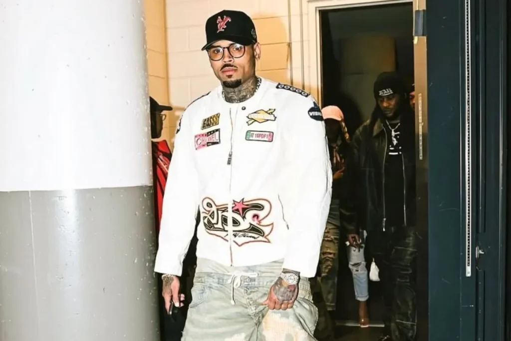 Chris Brown reveals secret master’s degree after four years